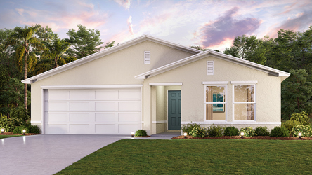 A white house with a lawn.