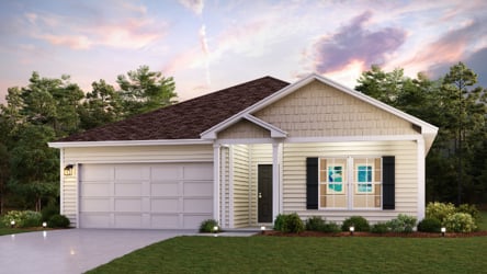 A house with a lawn in front of it.