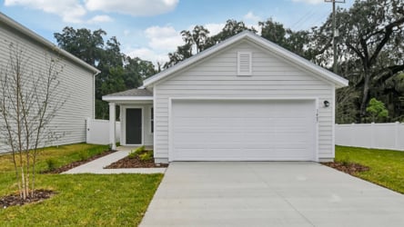 A white garage with a garage.