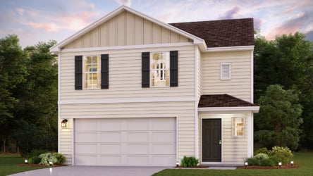 A white house with a garage.