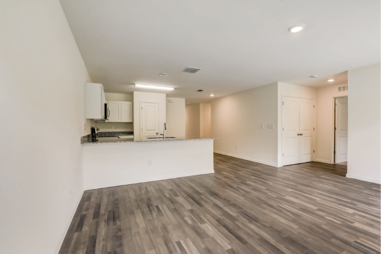 A room with white cabinets.