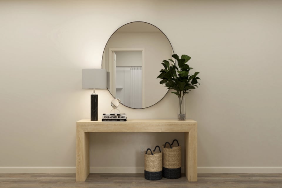 A mirror on a wall.