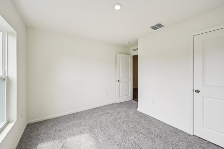 A room with white doors.