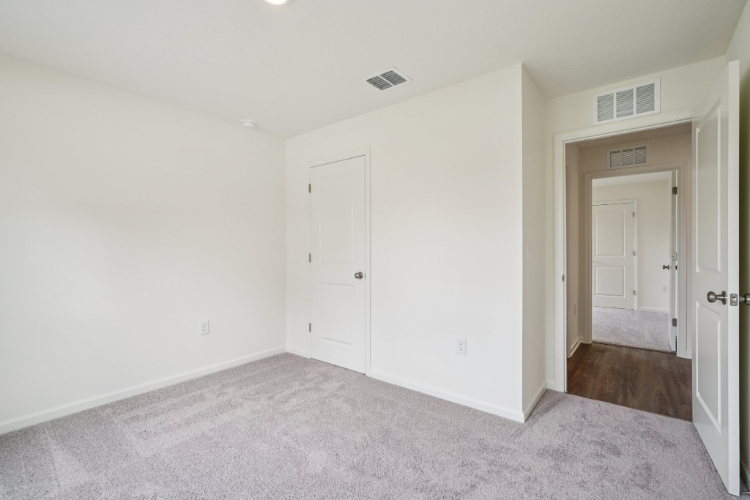 A room with white doors.