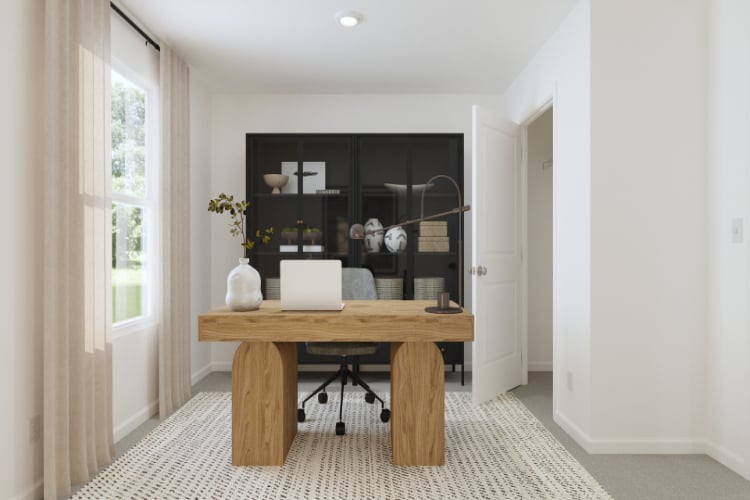 A room with a table and a mirror.