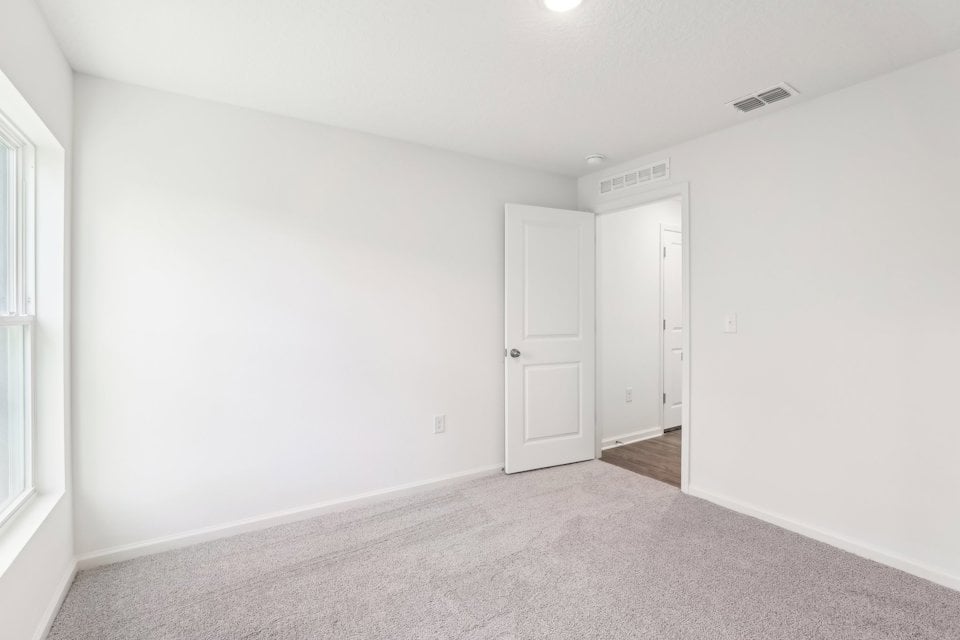 A room with white doors.