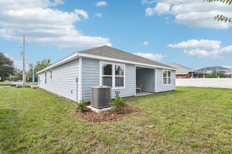 A small house with a small shed.