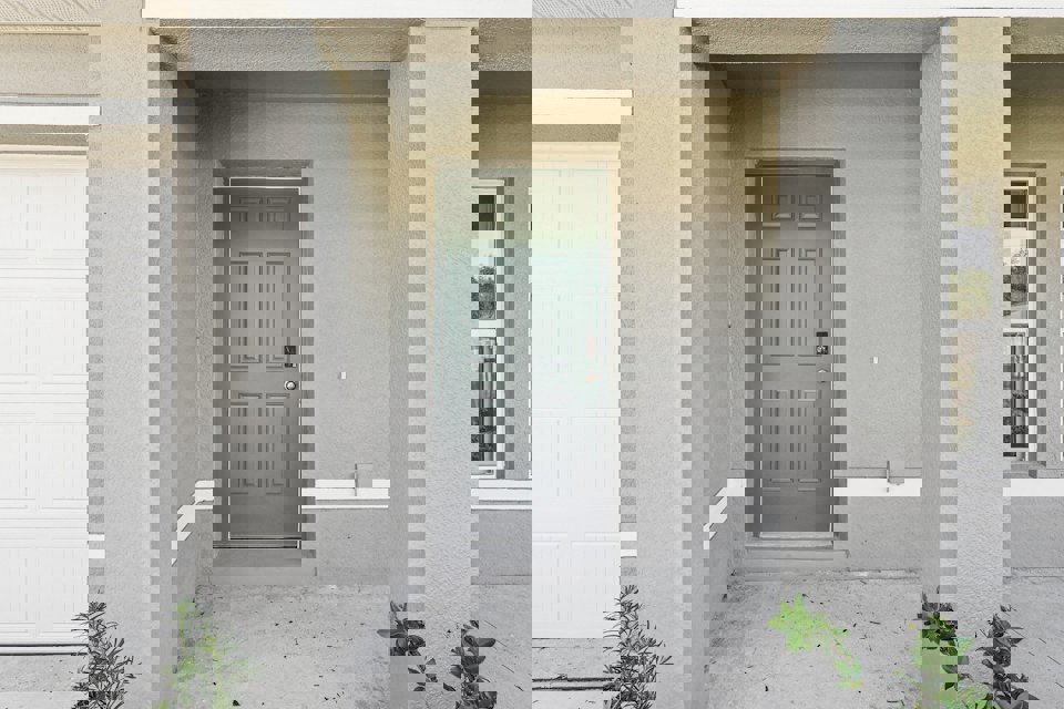 A white door in a building.