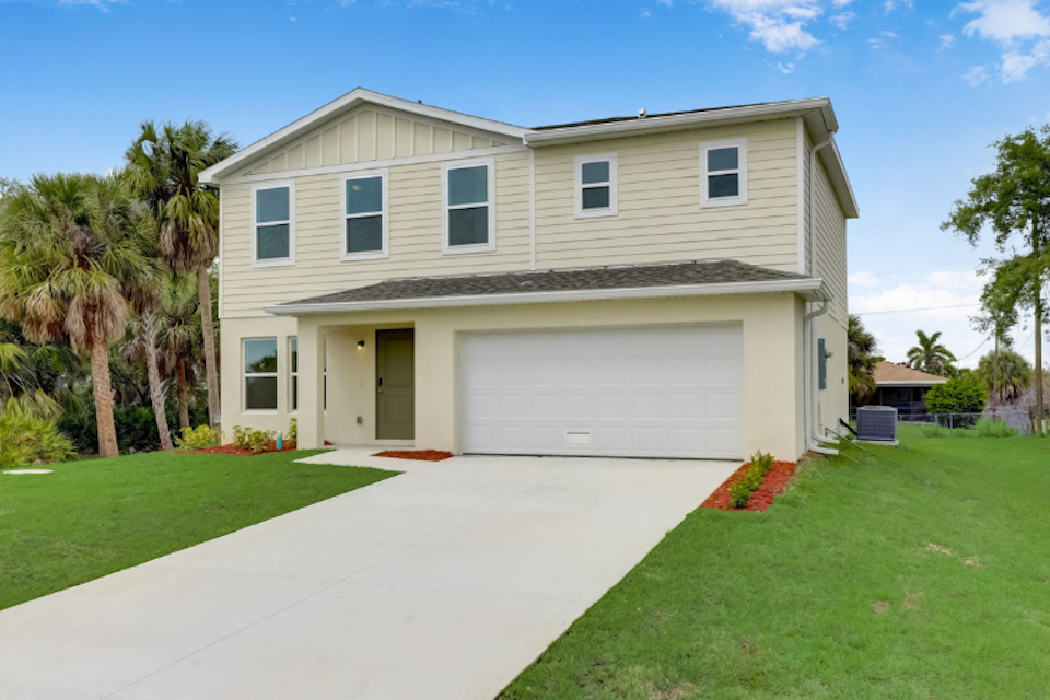 A house with a driveway.