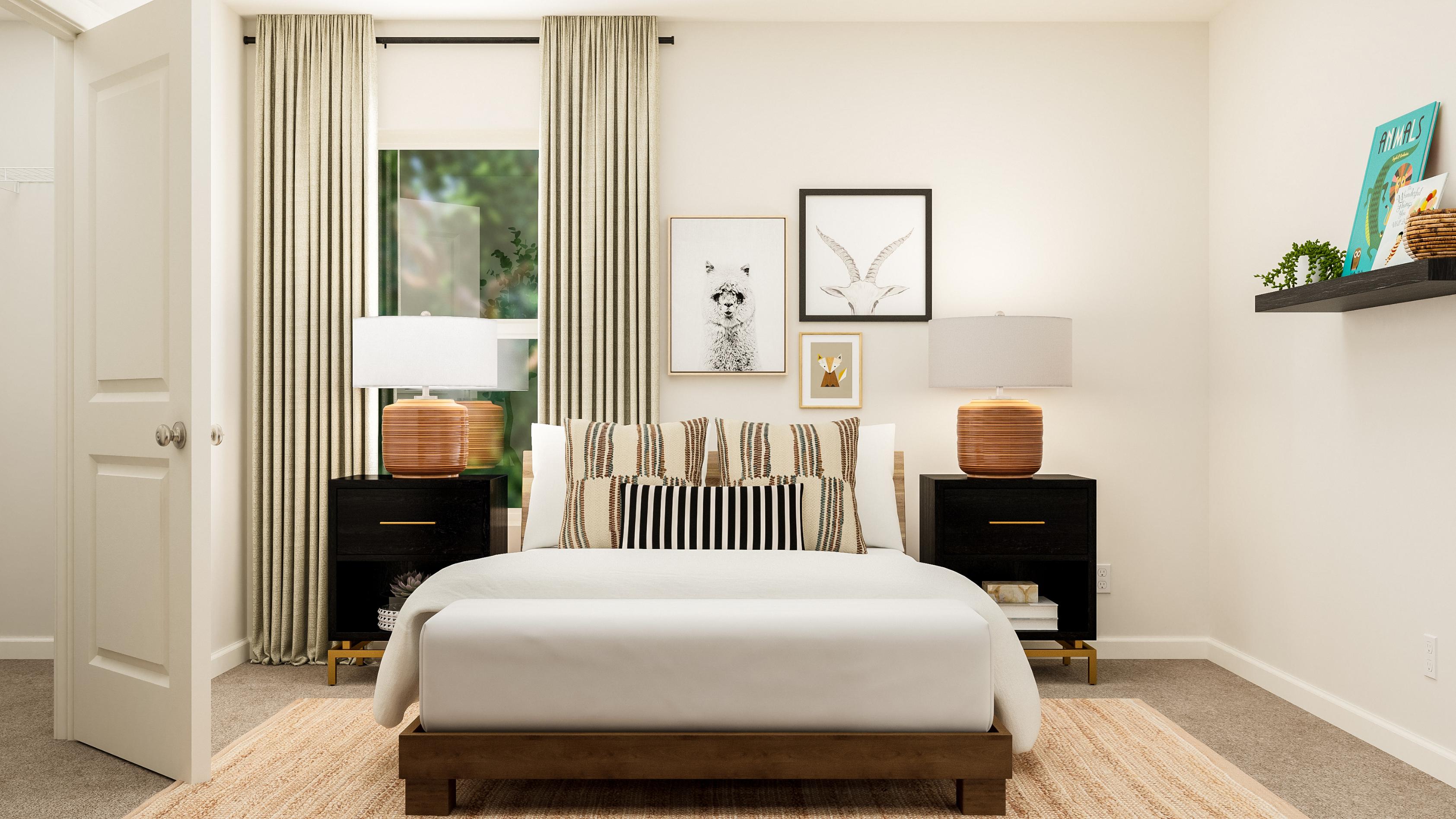 A bedroom with a bed and a lamp.