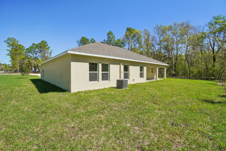 A small white house.