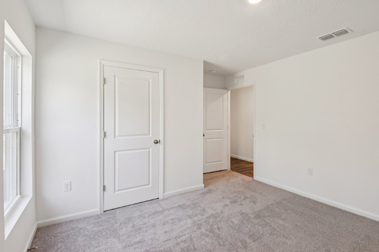 A room with white doors.