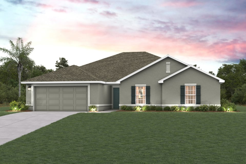 A house with a green lawn.