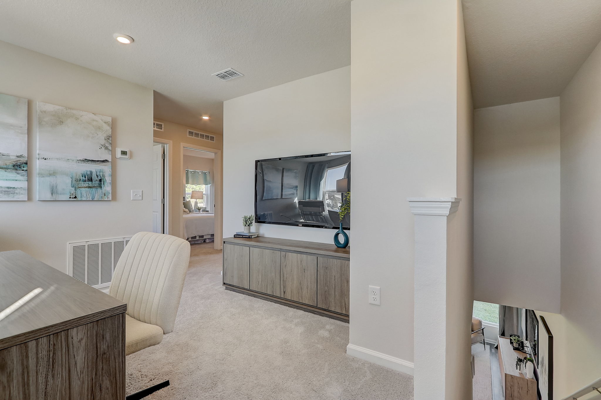 A living room with a tv and a couch.