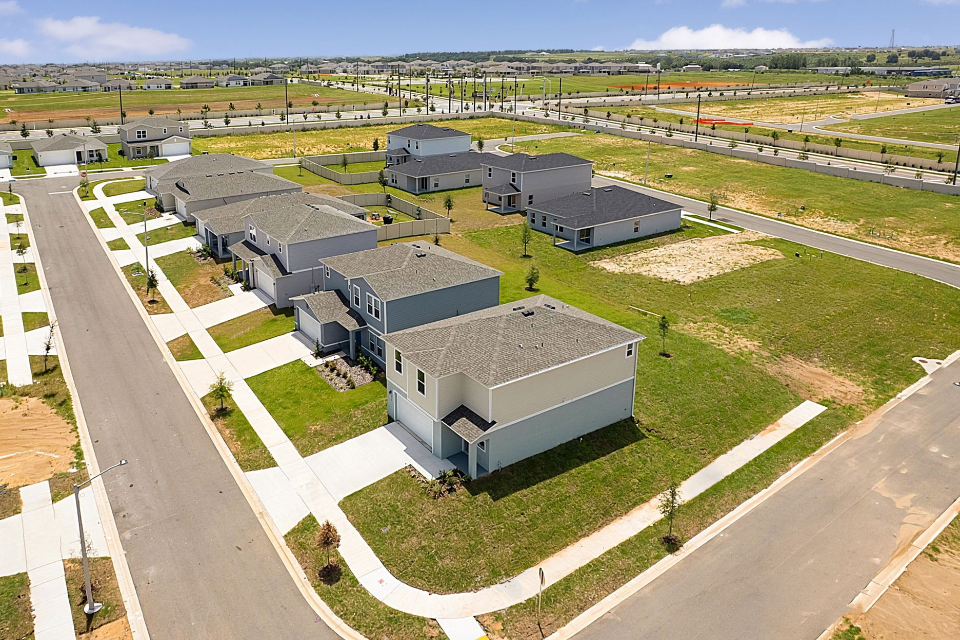 A group of buildings in a field.