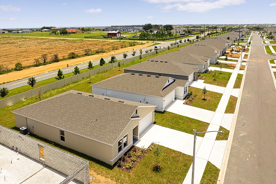 A building with a parking lot.