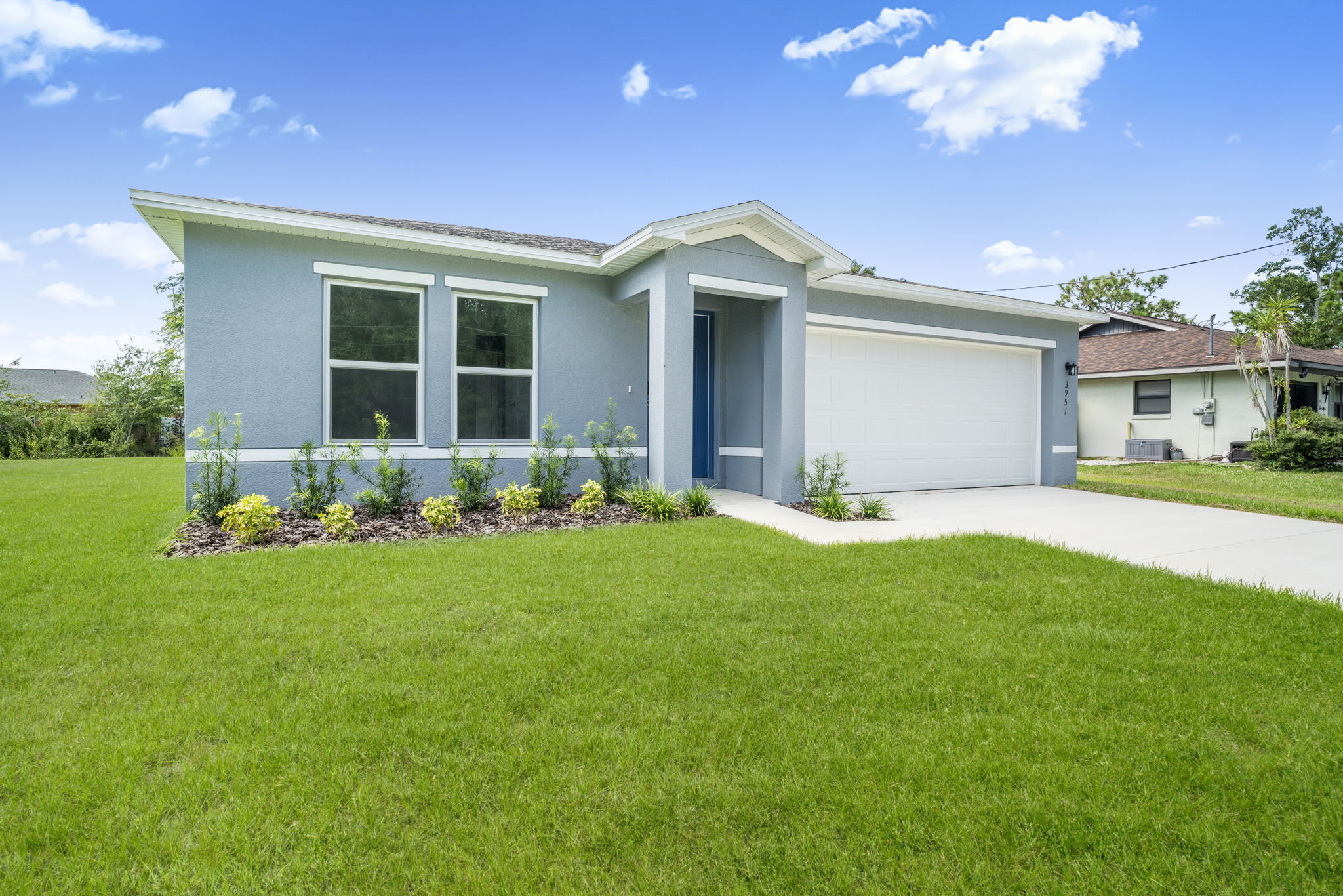 A house with a lawn.