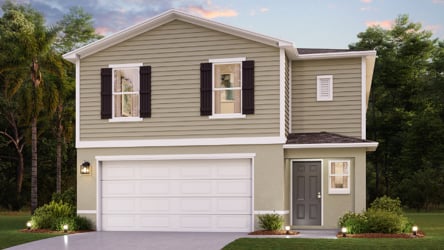 A white house with a garage.