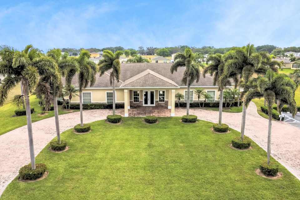 A house with palm trees.