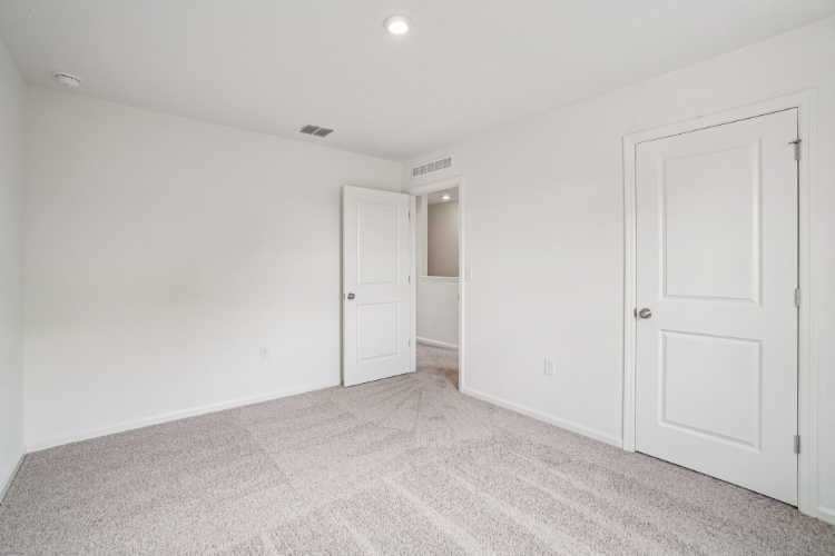 A room with white doors.