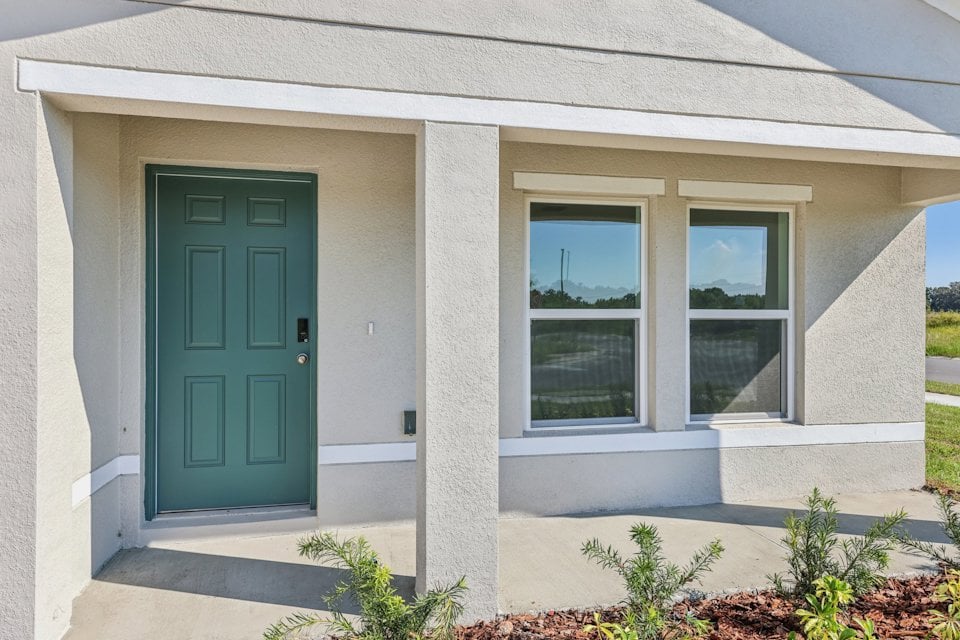 A house with a blue door.