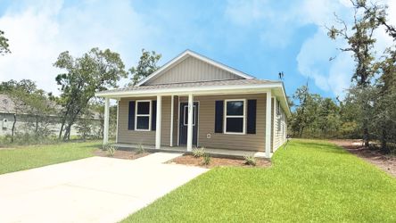 A small house with a small yard.