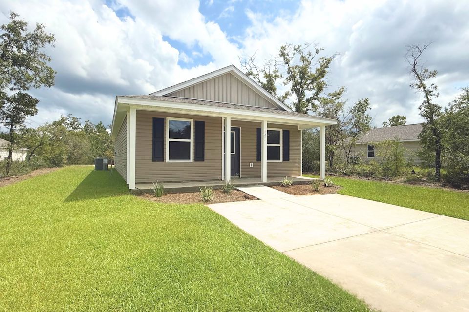 A house with a lawn.