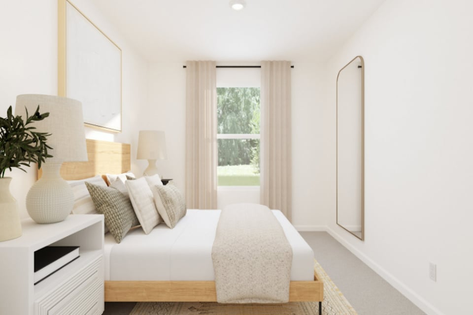 A white couch in a room.