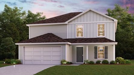 A house with a garage with American Gothic House in the background.