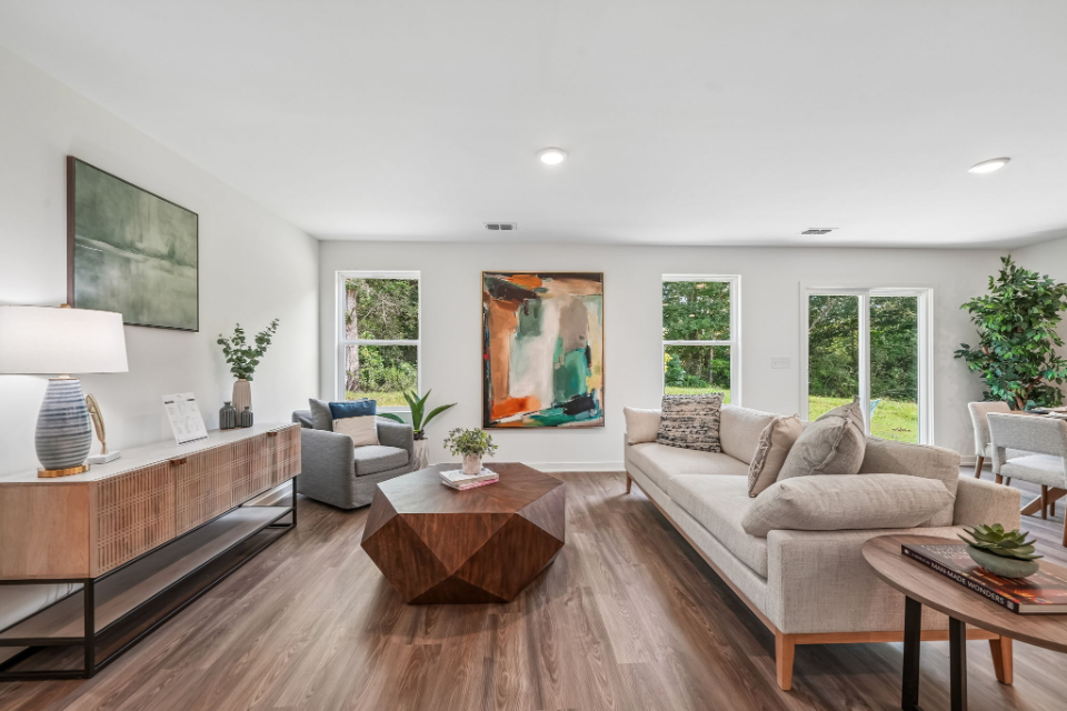 A living room with a large window.