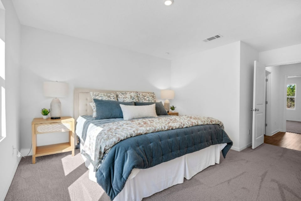 A bed in a room.