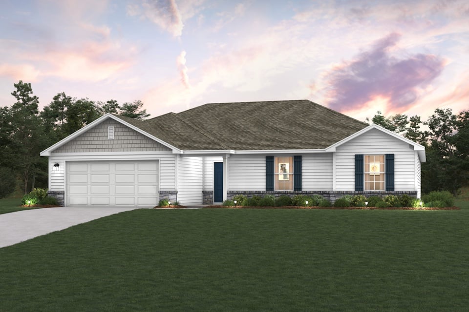 A house with a lawn in front of it.