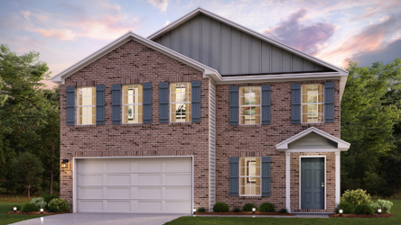 A brick house with a garage.
