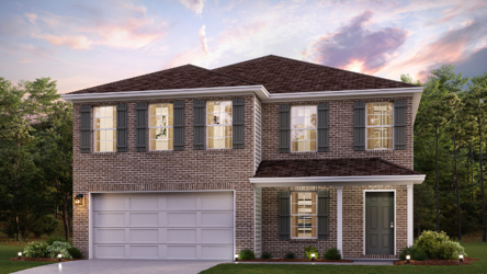 A large brick house with a garage.