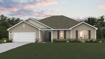 A house with a lawn in front of it.