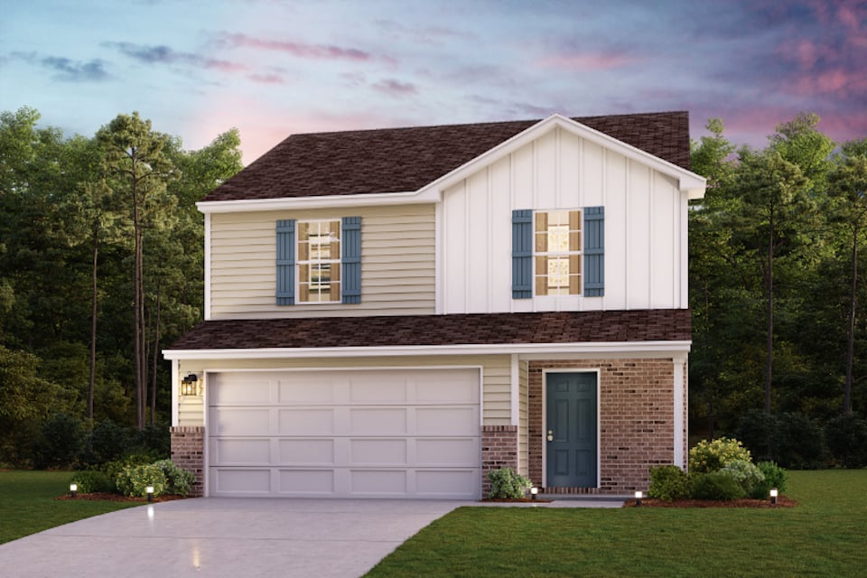 A house with a driveway and trees.