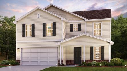 A white house with a lawn.