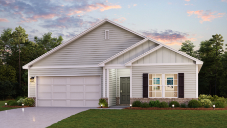 A white house with a lawn.