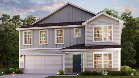 A house with a lawn in front of it.