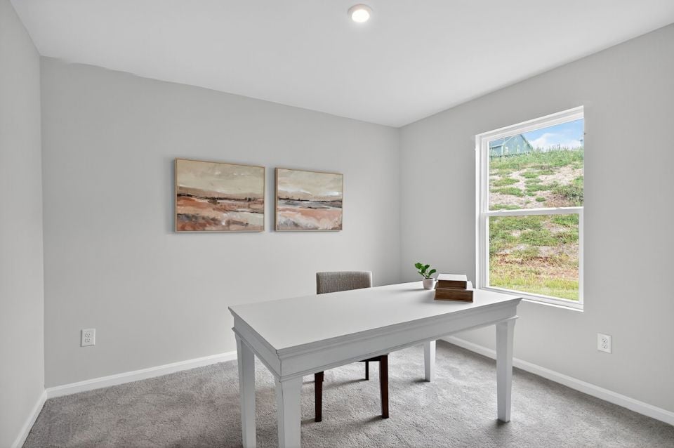 A white table in a room.