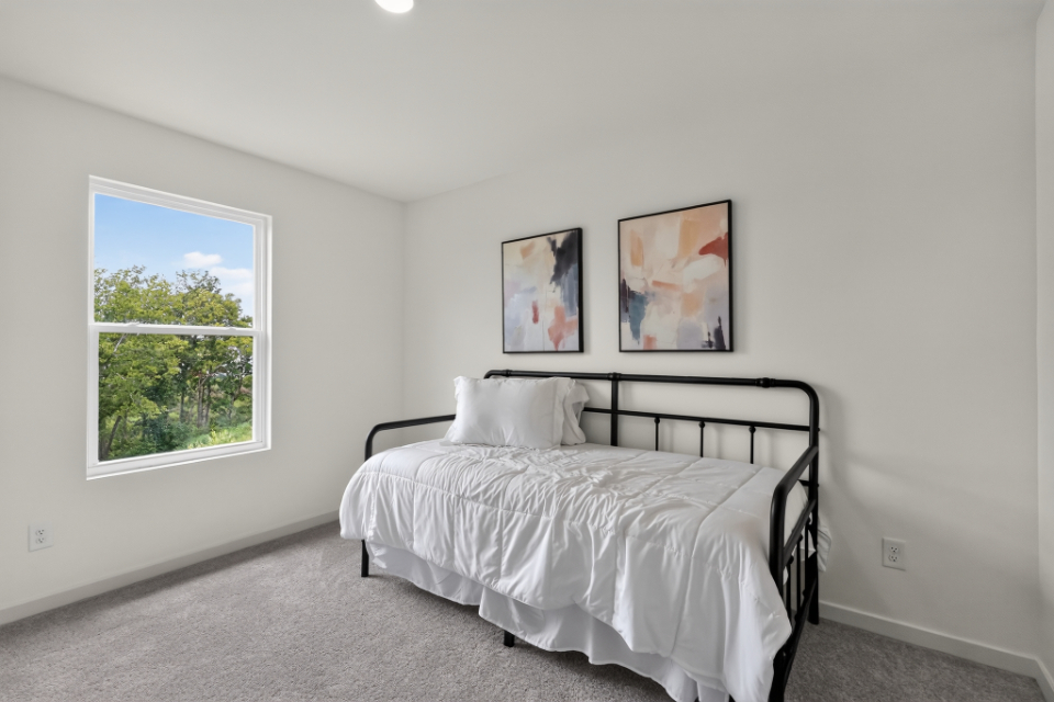 A bed in a room.