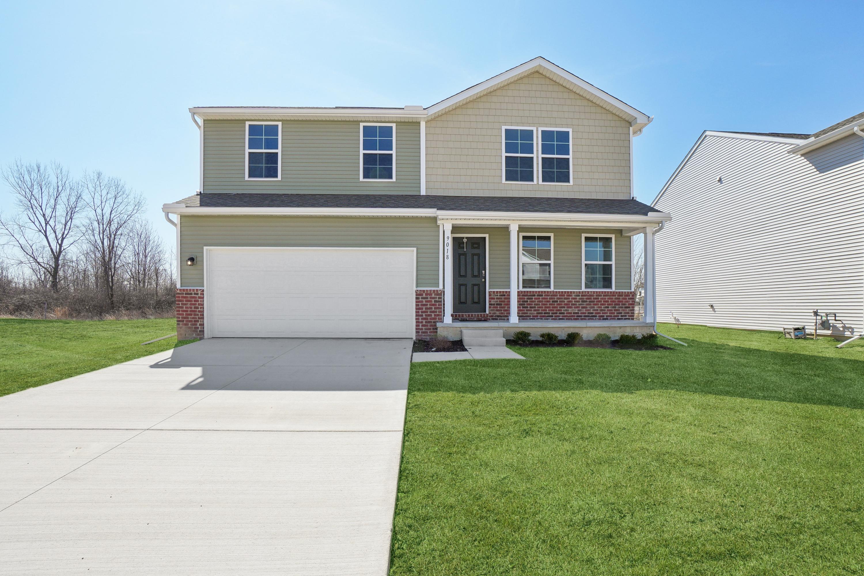 A house with a driveway.