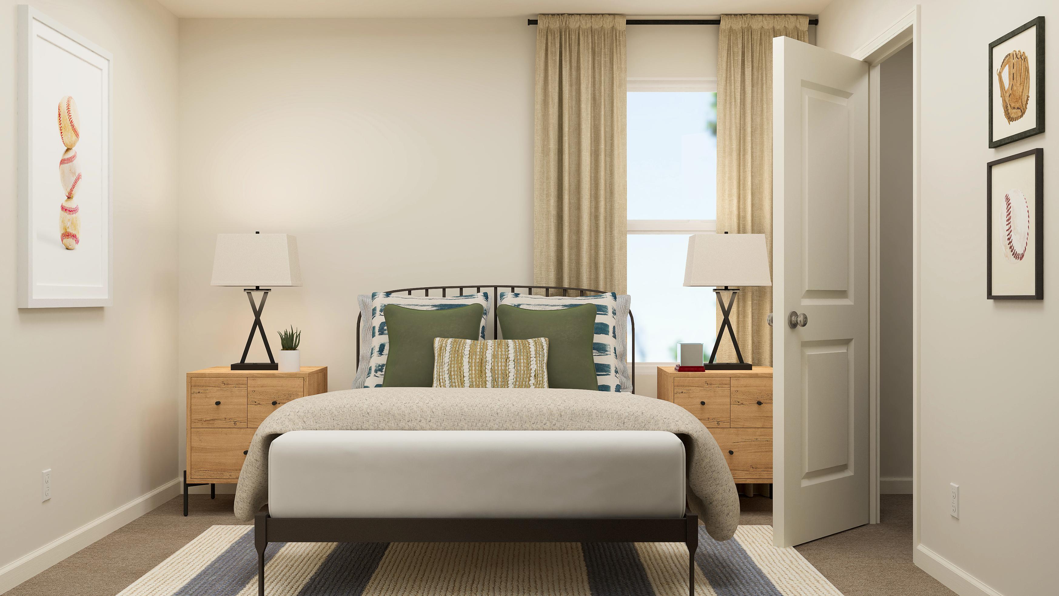 A bedroom with a bed and lamps.