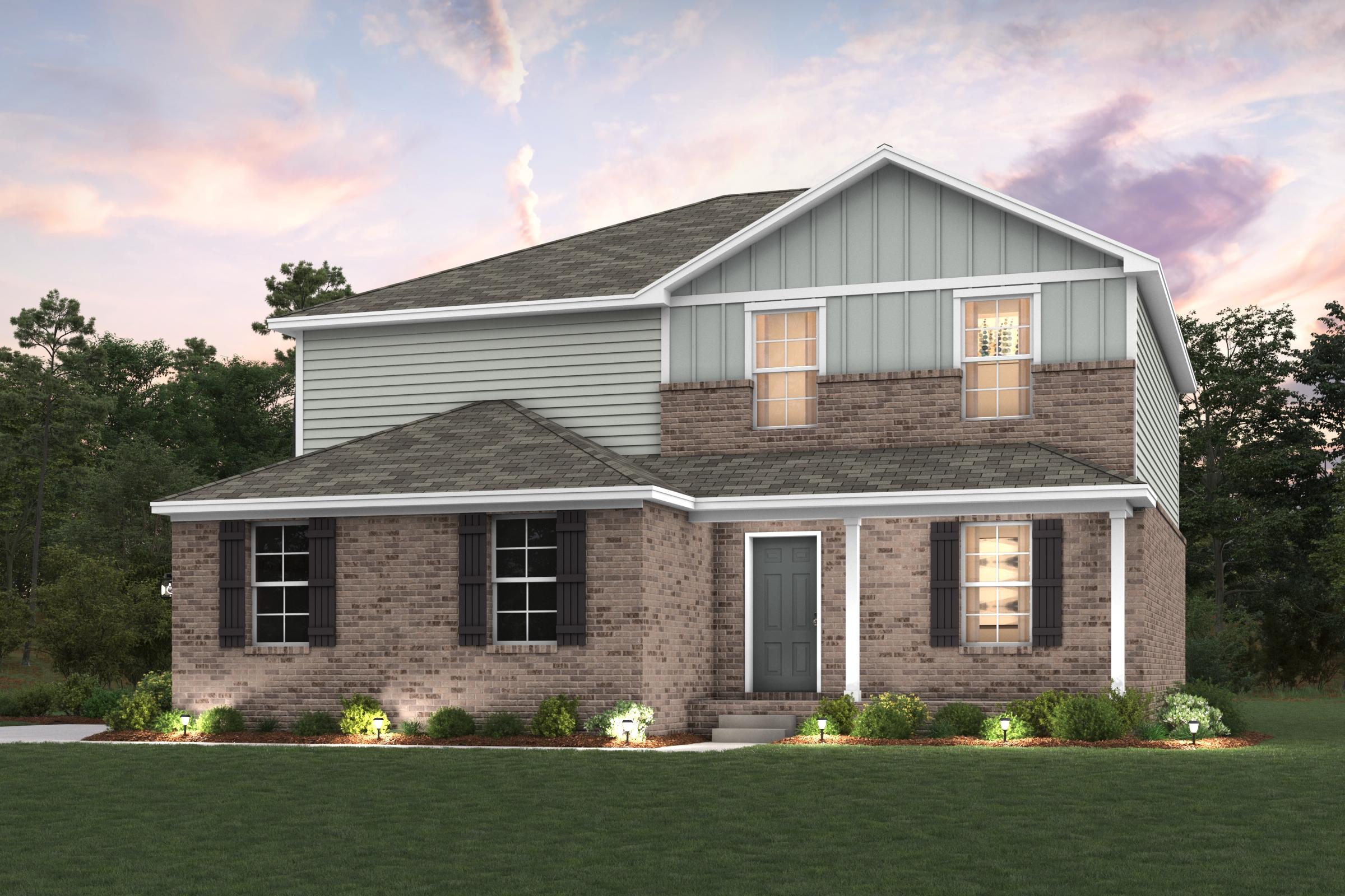 A house with a lawn in front of it.