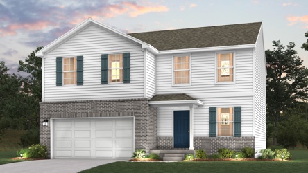 A white house with a garage.