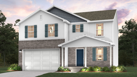 A white house with a garage.