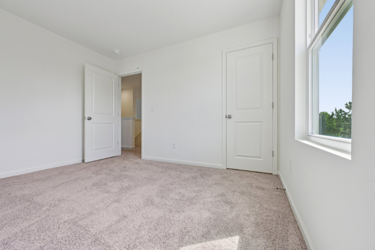 A room with white doors.