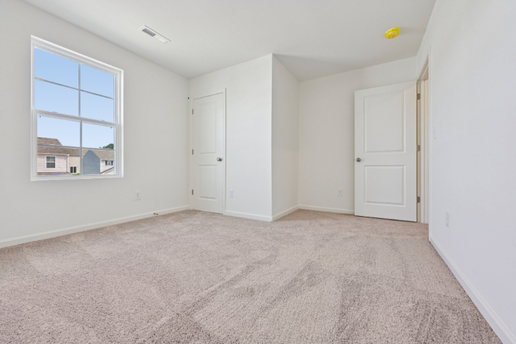 A room with white doors.