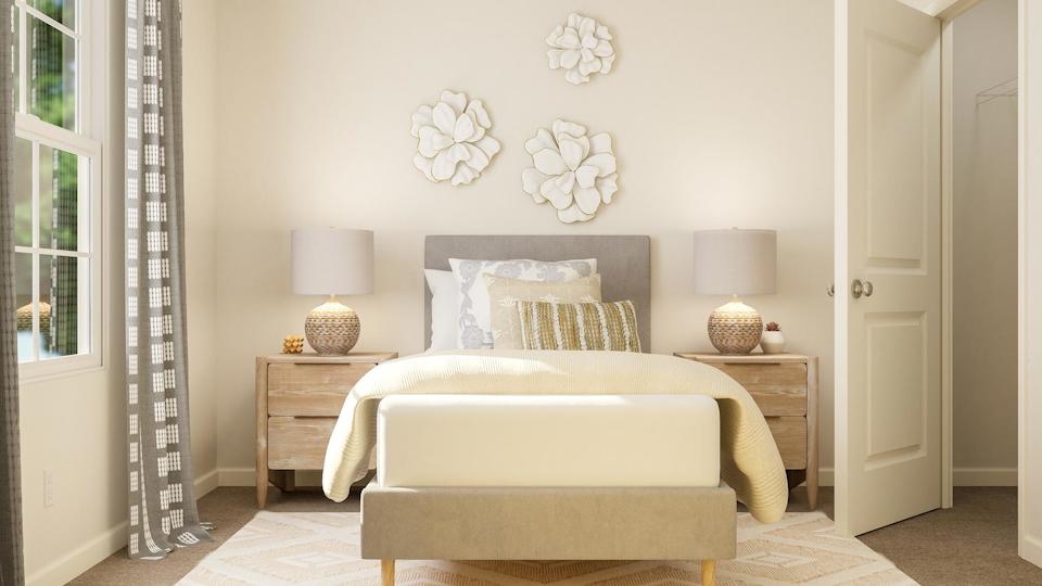 A white couch in a room.