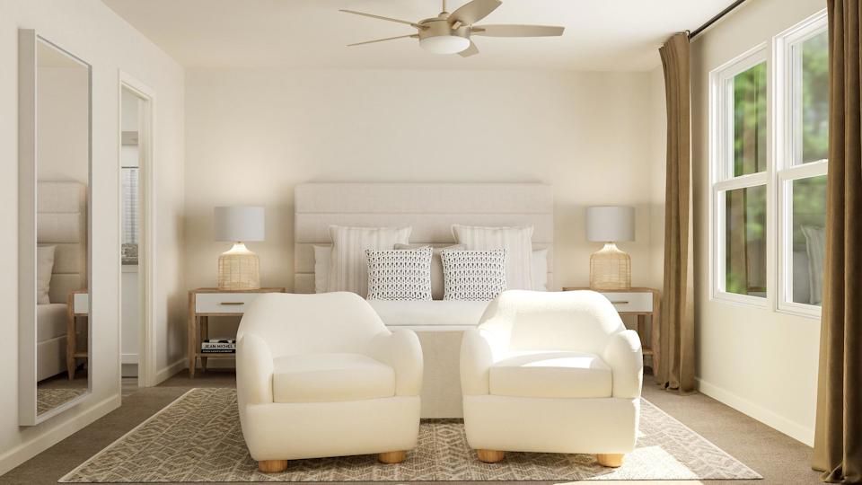 A room with white furniture.